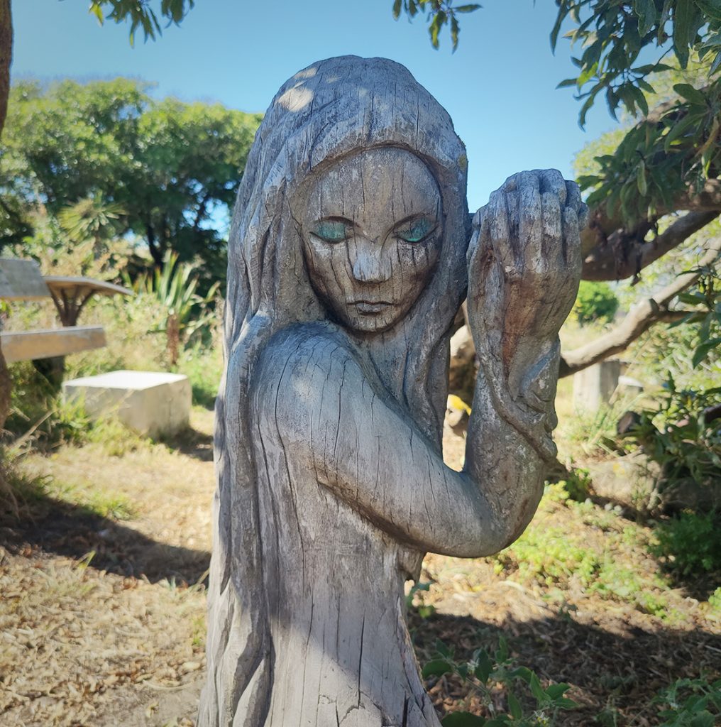 Wooden sculpture of a woman