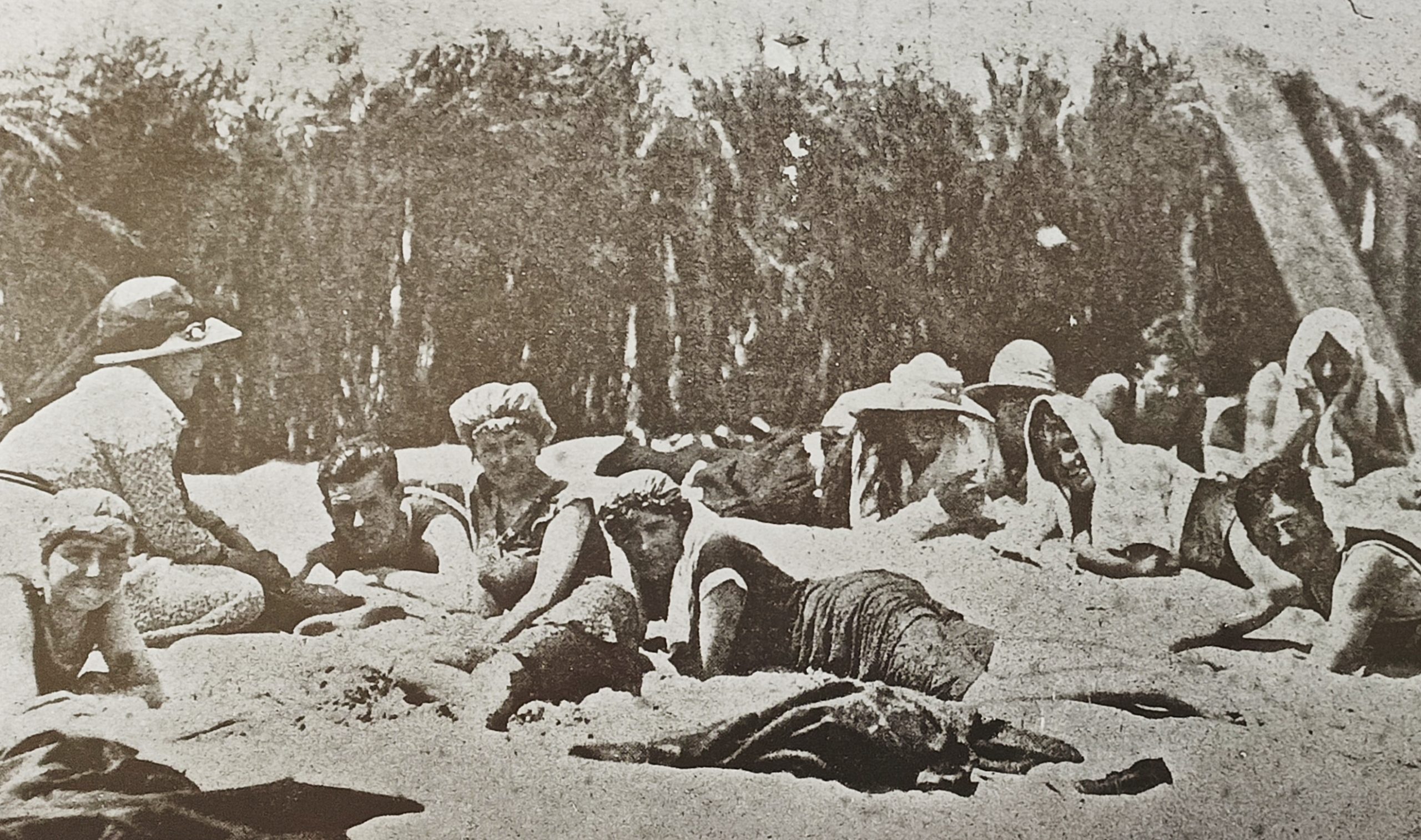 People sunbathing on the beach 1918